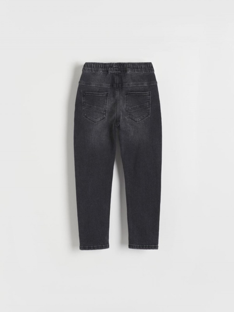 Black Reserved Elastic Carrot Boys' Jeans | UBGT-32568