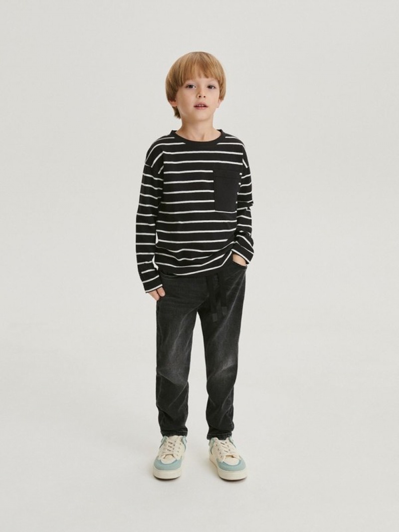 Black Reserved Elastic Carrot Boys' Jeans | UBGT-32568