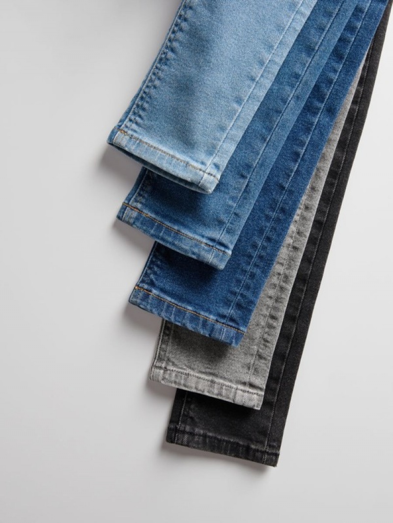 Blue Reserved Elastic Slim Boys' Jeans | OHMP-85347